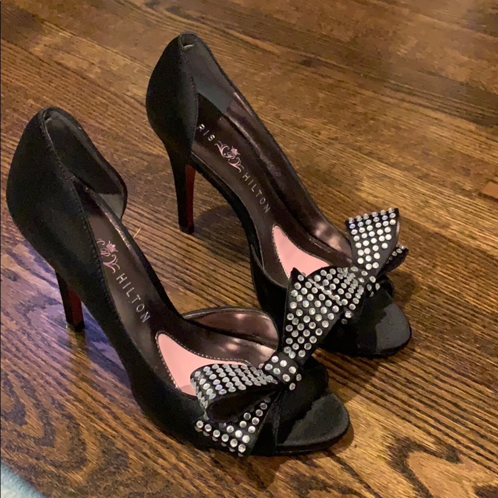 Paris Hilton black heels